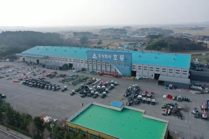 Wide aerial view of the Horyong factory and concrete pump equipment yard